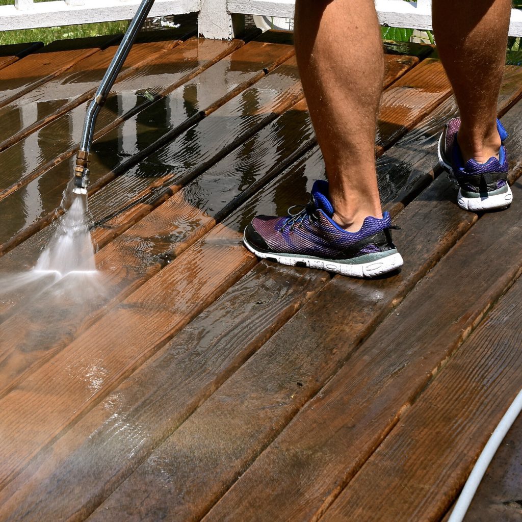 Contractors power wash deck.