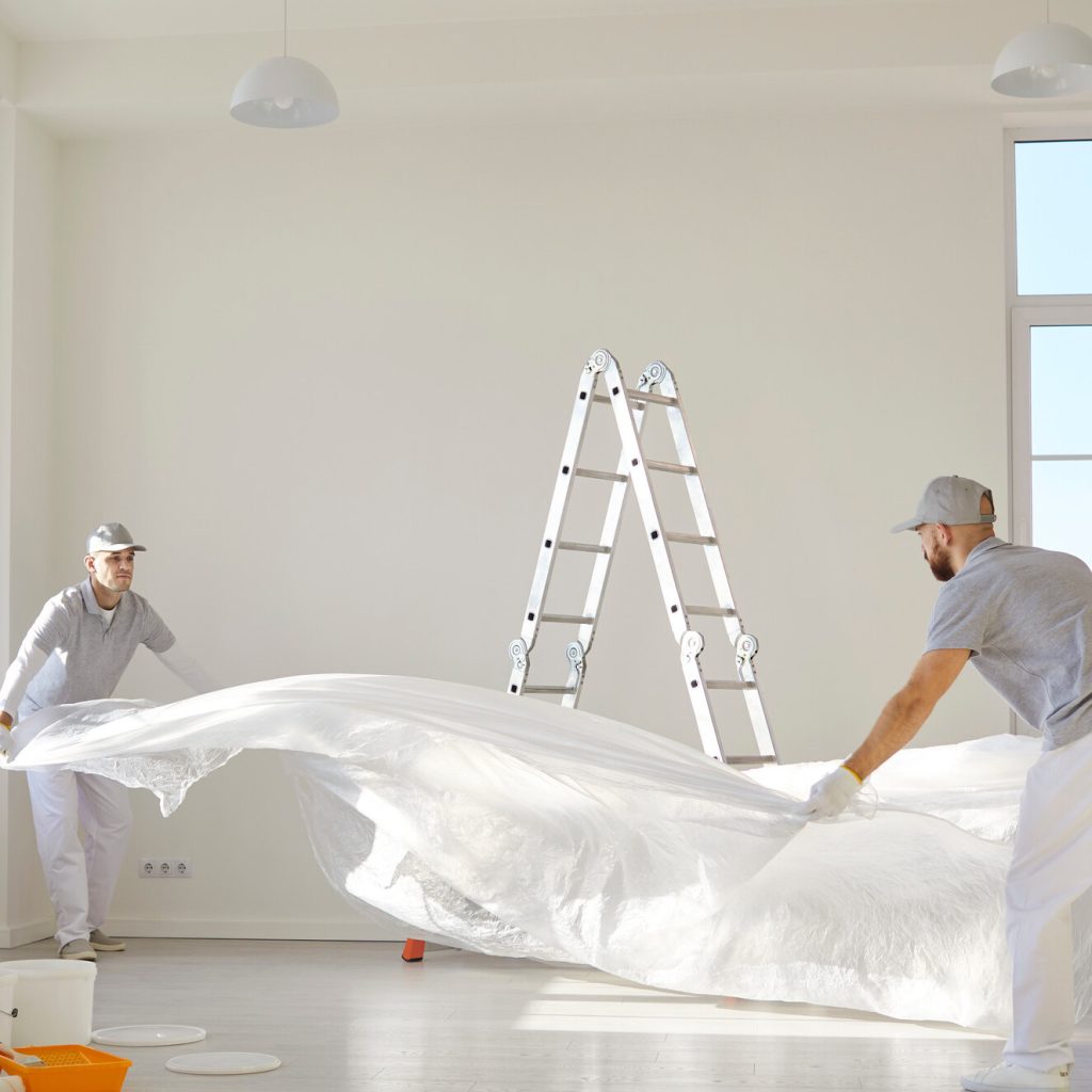 Contractors prepare for interior painting.